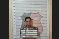Tersangka HS diamankan di Mapolsek Medan Tuntungan.(ist). 