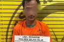 Tersangka saat diamankan di Polsek Bilah Hilir.(ist)